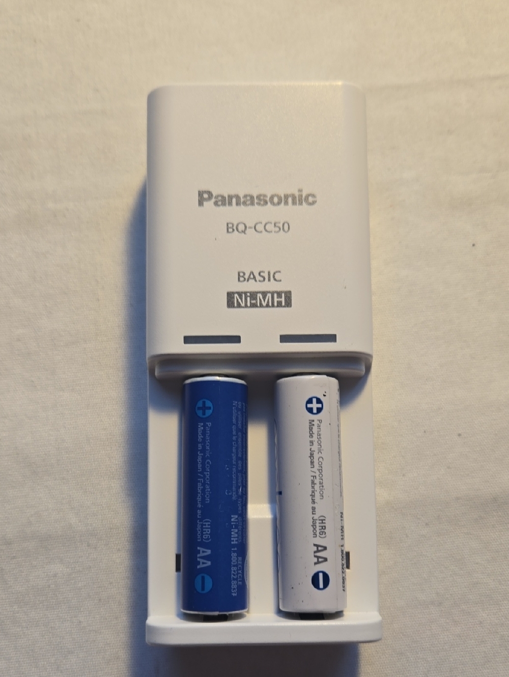 Panasonic White Battery Charger with Blue and White AA Batteries